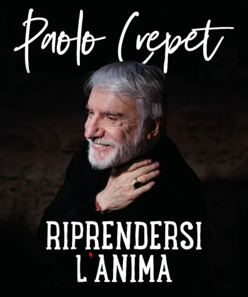 volto a tre quarti di Paolo Crepet sorridente 